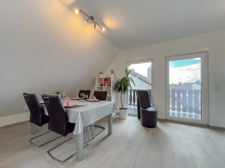 Bright dining area with a set table